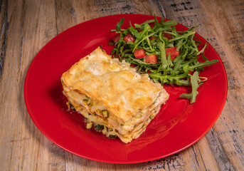 Recipe for vegetarian lasagna with goat cheese and arugula