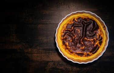 Parisian Flan, cutted classic tart served on a plate copy space