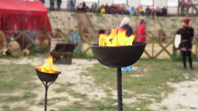 Gladiator Show in Ancient Rome. Burning torch. A Roman gladiator was an ancient professional fighter. They fought before the public in arena