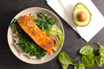 roasted salmon fillet with rice and spinach