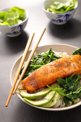 roasted salmon fillet with rice and spinach
