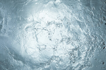 water liquid splash ripple wave in blue background