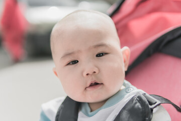 Baby enjoying sunshine outdoors