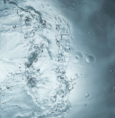 water liquid splash ripple wave in blue background