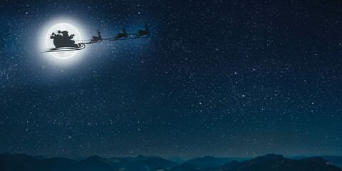 silhouette of a flying goth santa claus against the background of the christmas night sky.