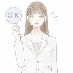 OKサインを出す女性医師
