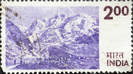 INDIA-CIRCA 1975: A post stamp printed in India showing a landscape view of the Himalayan mountain...