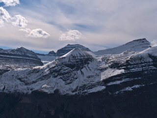 View of rugged mountain Big Bend Peak covered by ice and snow viewed from Parker Ridge in Banff National Park, Alberta, Canada in the Rockies.