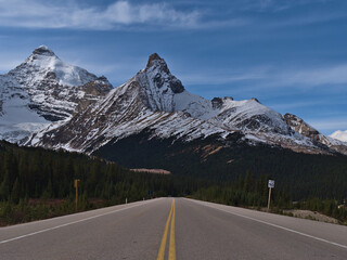 Beautiful view of popular Icefields Parkway in Banff National Park, Alberta, Canada in the Rocky Mountains with snow-capped Mount Athabasca.