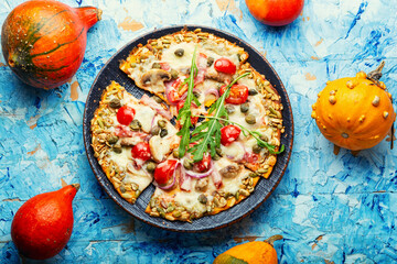 Pizza on pumpkin flatbread