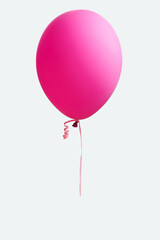 Pink balloon isolated over pink background, lightness, easiness concept, minimalism