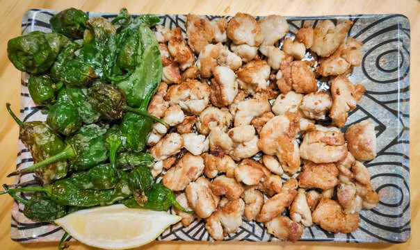 Raci&oacute;n de esquisitas mollejas de lechazo cordero a la plancha con pimientos verdes de piquillo en Valladolid.jpg