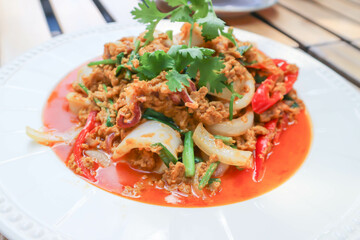stir-fried seafood in curry powder, stir fried squid in yellow curry or Stir-fried squid with curry