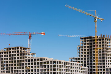 construction of a residential building. monolith or frame of an apartment building, engineering and design of multi-storey buildings. view of the construction site of a large concrete house. a house