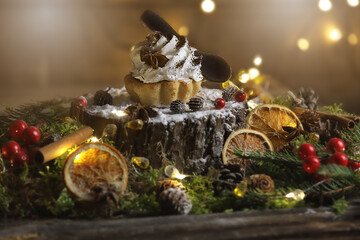 Festive tartlet with cream chokolate spoon on a festive background