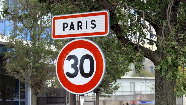 Paris entrance traffic sign with a speed limit for cars of 30 kilometers per hour