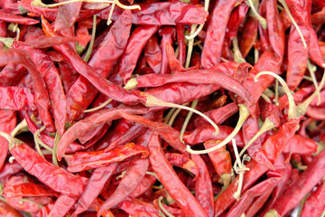 Red dry chili texture background. dry chili for make a cayenne or preserve food to keep for a long time.
