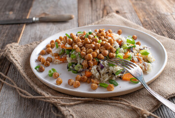 Rice with chickpeas and vegetables. Healthy vegan dish for dinner or lunch