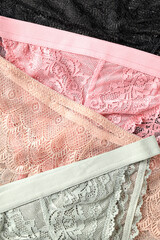 Beautiful women's panties all over background, close up