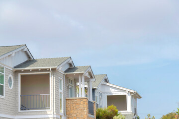 Low angle view of houses with shingle sidings and balcony at La Jolla, California