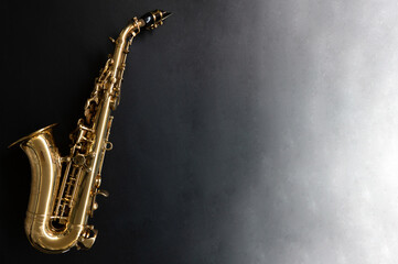Saxophone jazz instruments. Soprano sax isolated. Saxophone music instrument closeup on black