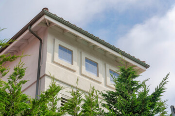 Fototapeta na wymiar Low angle view of a beige mediterranean house at La Jolla, California