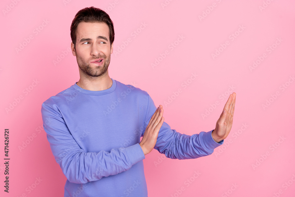 Poster Photo of beard sad guy decline empty space wear blue pullover isolated on pastel pink color background