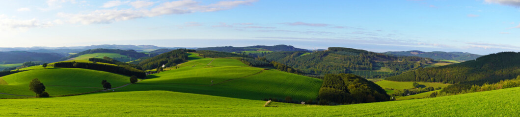 Landscape in the Sauerland near Oberhenneborn. Panoramic view of the green nature with hills and forests.
