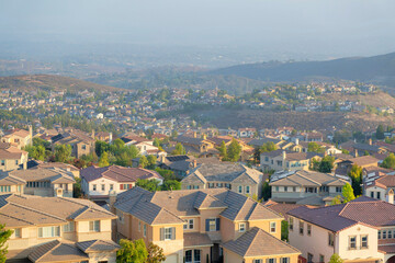Fototapeta na wymiar Houses in a high angle view at the Double Peak Park in San Marcos, California
