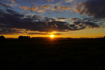 Sunset in the Sauerland. Landscape with setting sun in the evening.