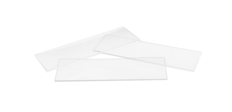Clean glass microscope slides on white background