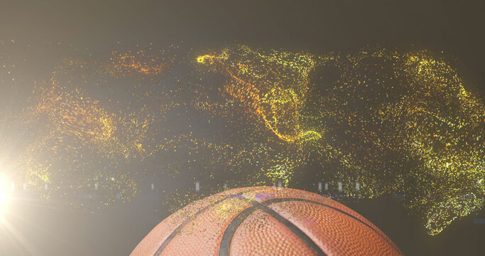 Image of glowing gold particles moving over basketball