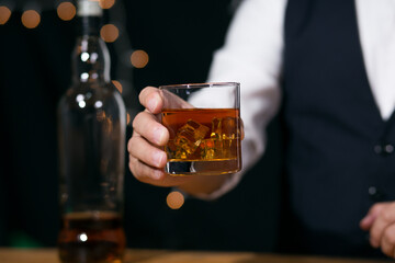 Barman pouring whiskey whiskey glass beautiful night