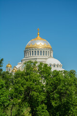 Fototapeta na wymiar Golden Dome of the Naval cathedral of Saint Nicholas in Kronstadt built as the main church of the Russian Navy and dedicated to all fallen seamen on Kotlin Island