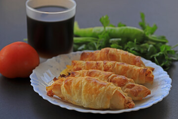 Turkish style potato pie in the form of a roll, made by wrapping dough.