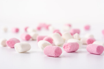 Obraz na płótnie Canvas Sweet marshmallows topping isolated on white background