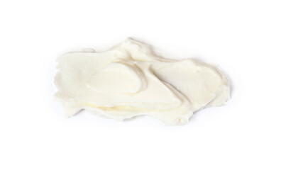 Smear of delicious cream cheese isolated on white, top view