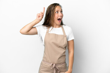Restaurant waiter caucasian woman isolated on white background intending to realizes the solution while lifting a finger up