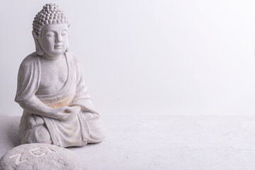Stone buddha white background
