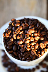 Selective focus. Coffee beans. Roasted arabica and rubust.
