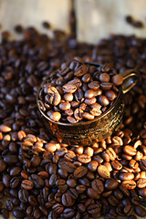 Selective focus. Coffee beans. Roasted arabica and rubust.