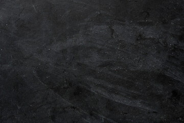 Fototapeta na wymiar Empty school chalk board on a wooden table. Empty space to enter text or insert graphics. Concept in education or business.