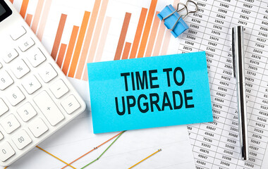 Obraz premium TIME TO UPGRADE text on sticker on diagram background