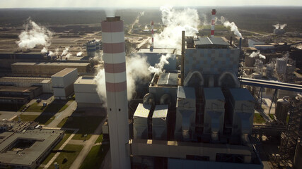 Aerial close up white smoke from factory pipes chimney Environmental pollution smog problem, global...