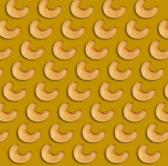 Many tasty cashew nuts on brownish-yellow background, flat lay
