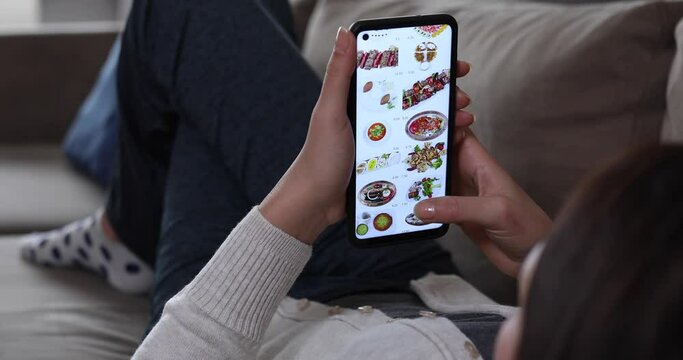 woman searching food on food mobil applications