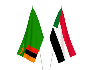 National fabric flags of Sudan and Republic of Zambia isolated on white background. 3d rendering illustration.