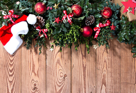 Christmas background with decoration ball , Red celebration balls on wooden board