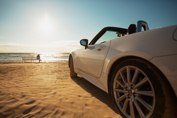 Exclusive car on sand road or beach in summer