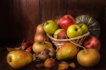 Fruits and vegetables on a dark wooden background